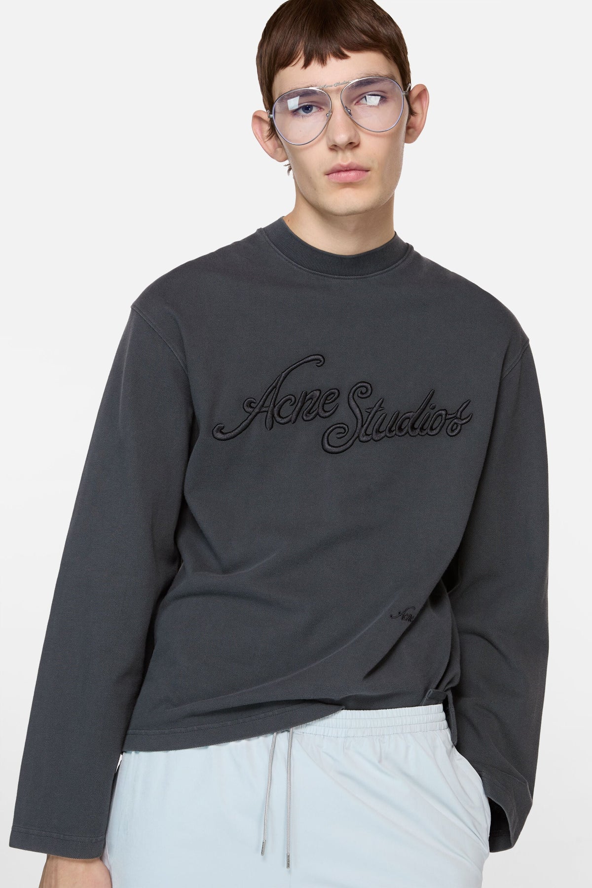 ACNE STUDIOS 3D EMBROIDERED LOGO LONG-SLEEVE T-SHIRT — FADED BLACK — styled view
