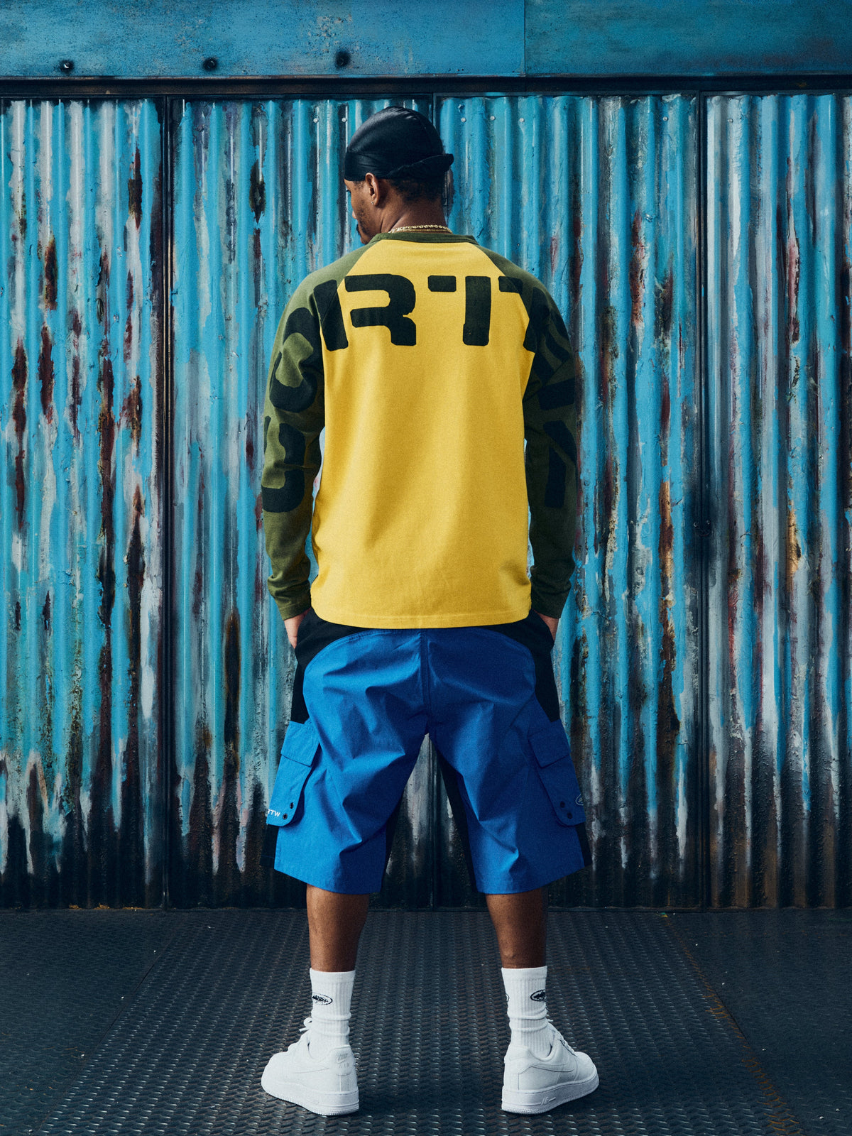 CORTEIZ Stencil Raglan Long Sleeve — Gold/Olive — styled view