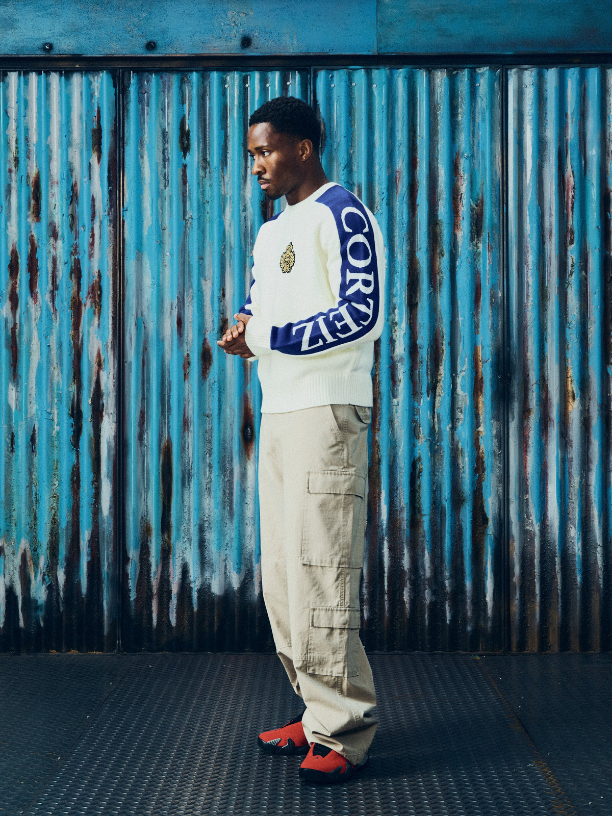 Corteiz VVS Panel Knit Sweater — Cream — styled view