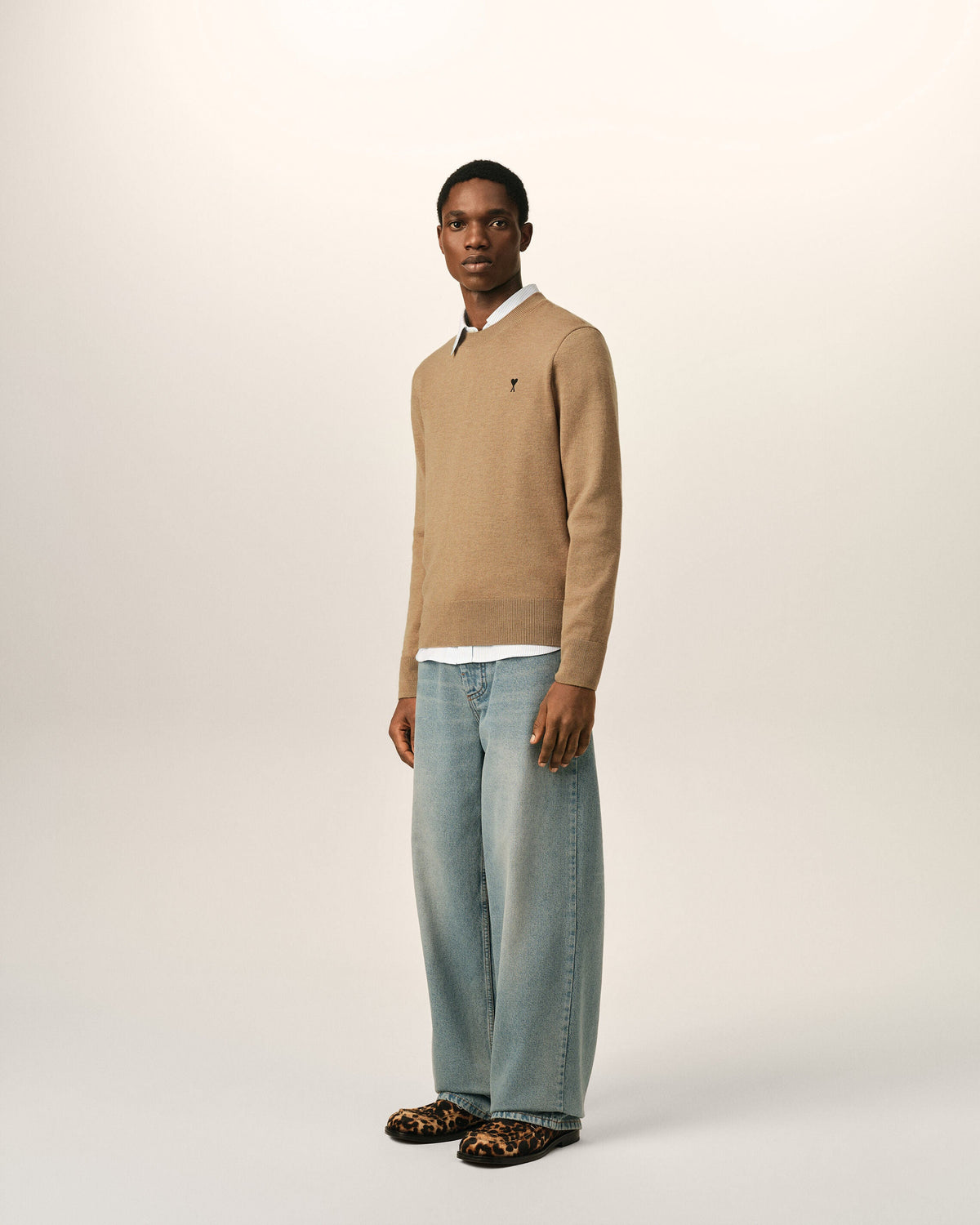 AMI Paris Ami de Cœur Small Logo Crewneck Sweater — Camel / Black — styled side view