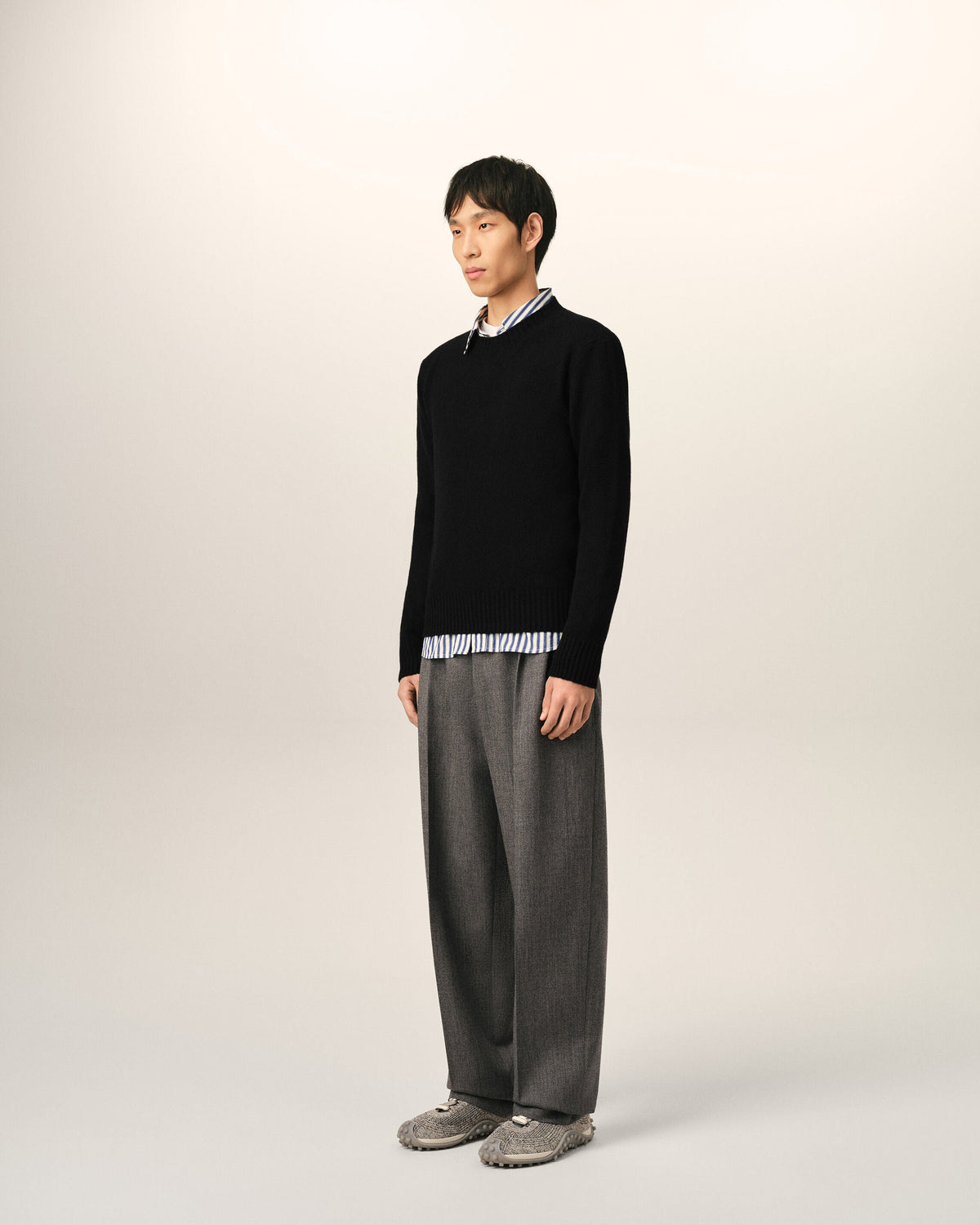 AMI Paris Ami de Cœur Fine Knit Small Logo Crewneck Sweater — Black / Tonal — styled side view