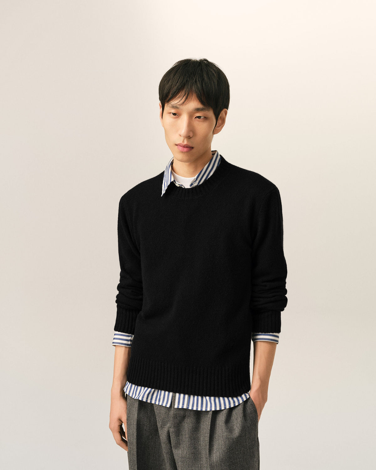 AMI Paris Ami de Cœur Fine Knit Small Logo Crewneck Sweater — Black / Tonal — styled front view