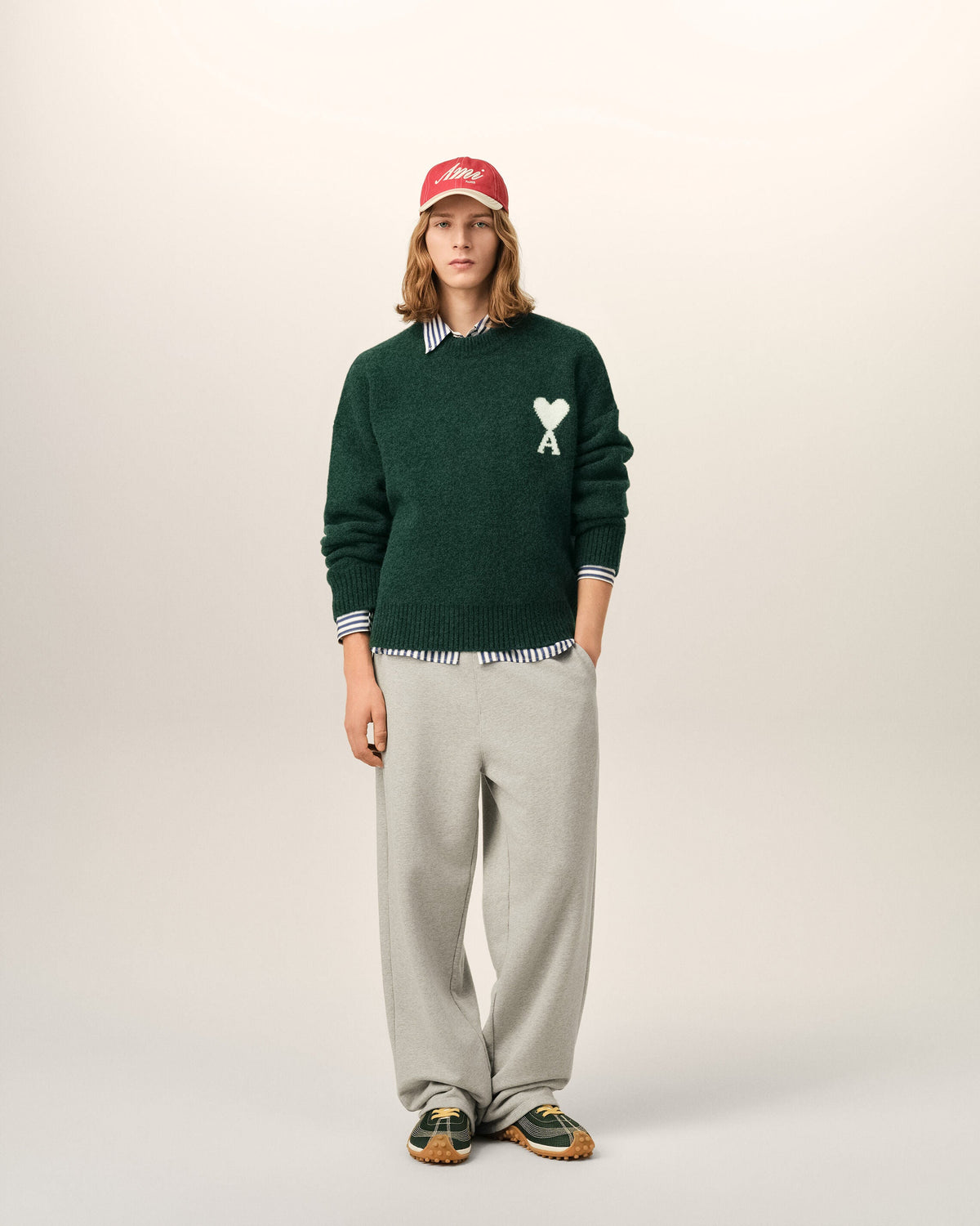 AMI Paris Ami de Cœur Textured Logo Crewneck Sweater — Forest Green / Ivory — styled front view