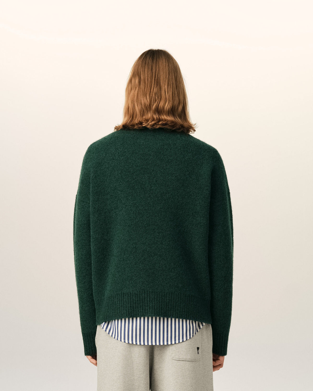 AMI Paris Ami de Cœur Textured Logo Crewneck Sweater — Forest Green / Ivory — styled back view