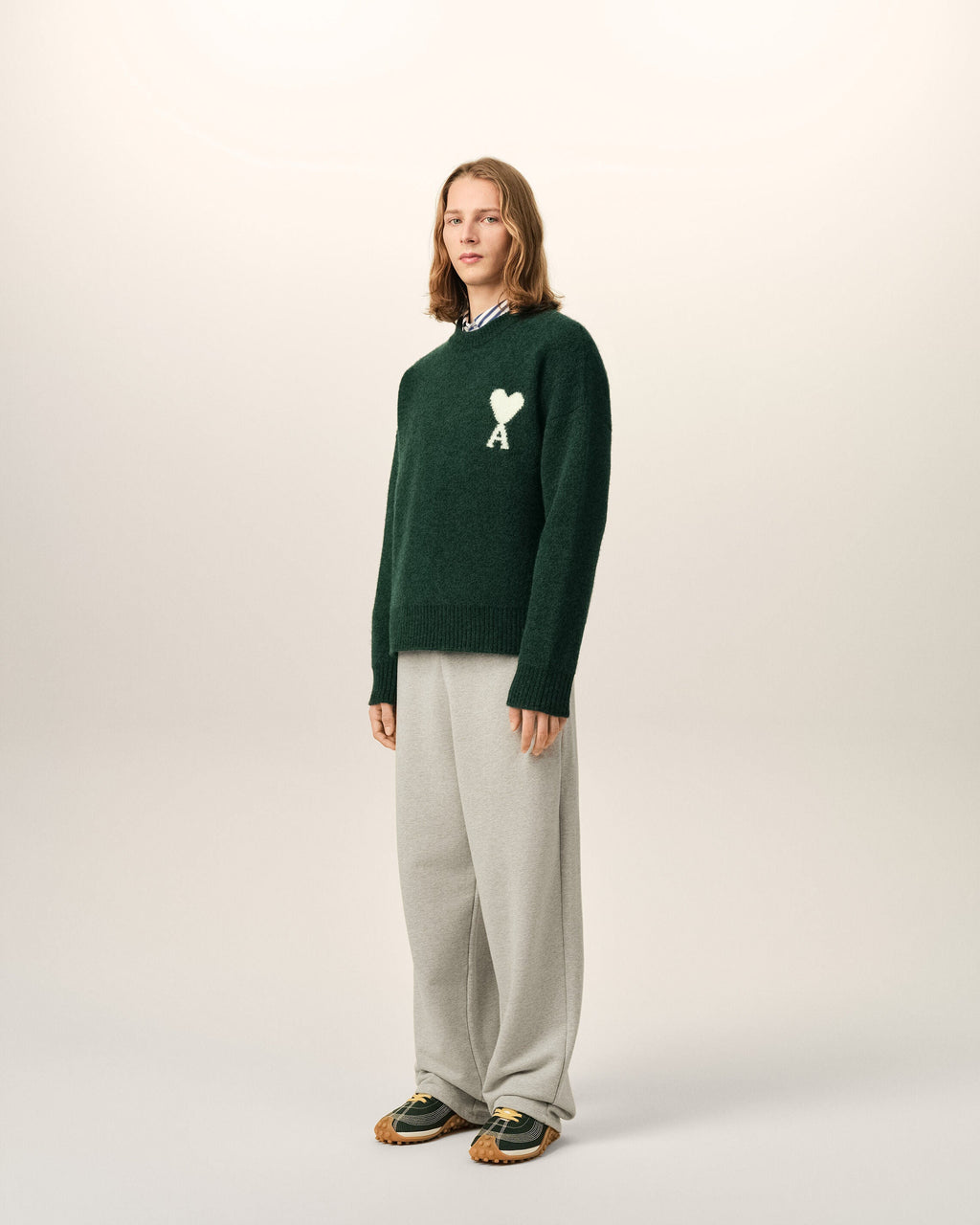 AMI Paris Ami de Cœur Textured Logo Crewneck Sweater — Forest Green / Ivory — styled side view