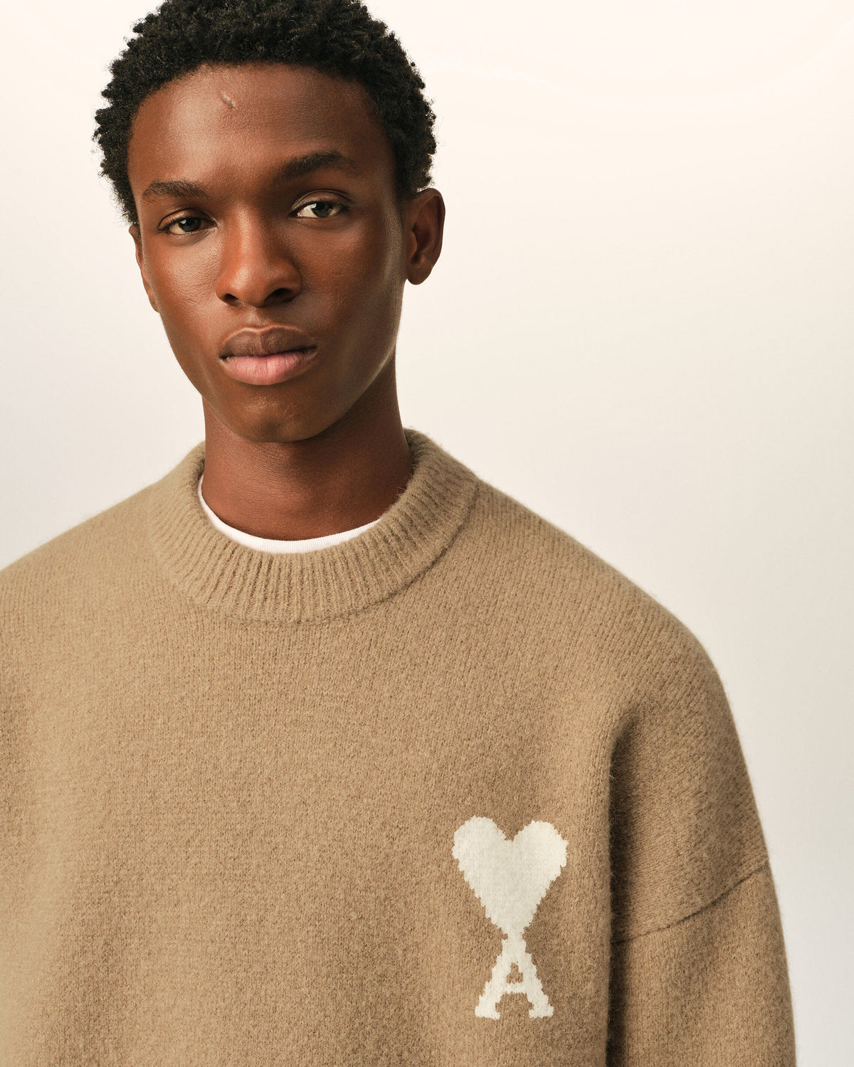 AMI Paris Ami de Cœur Textured Logo Crewneck Sweater — Camel / Ivory — logo and knit detail