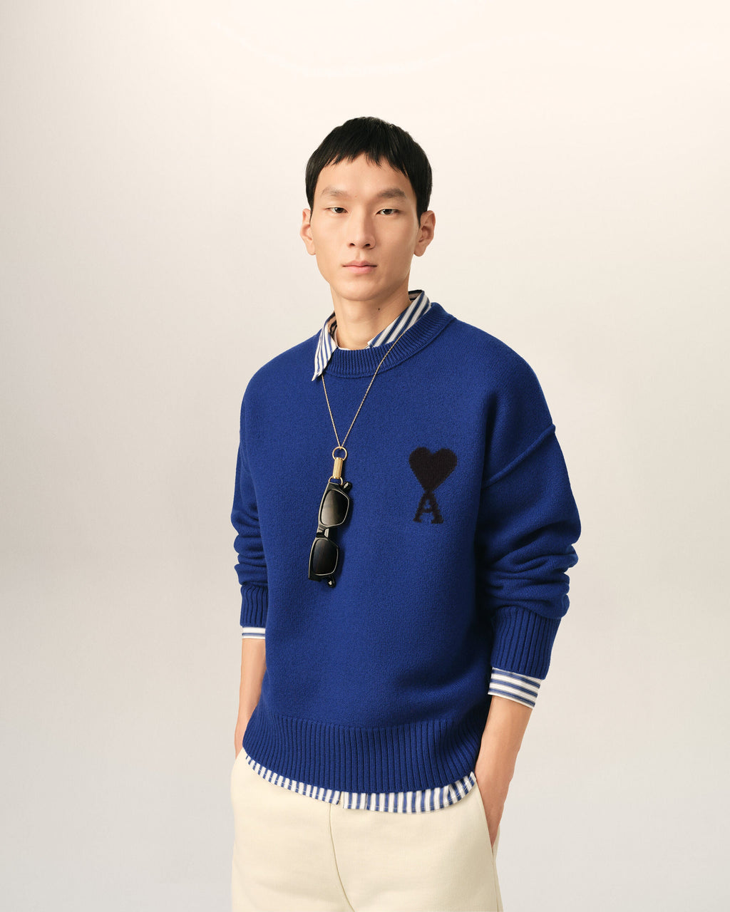 AMI Paris Ami de Cœur Large Logo Crewneck Sweater — Royal Blue / Black — styled front view