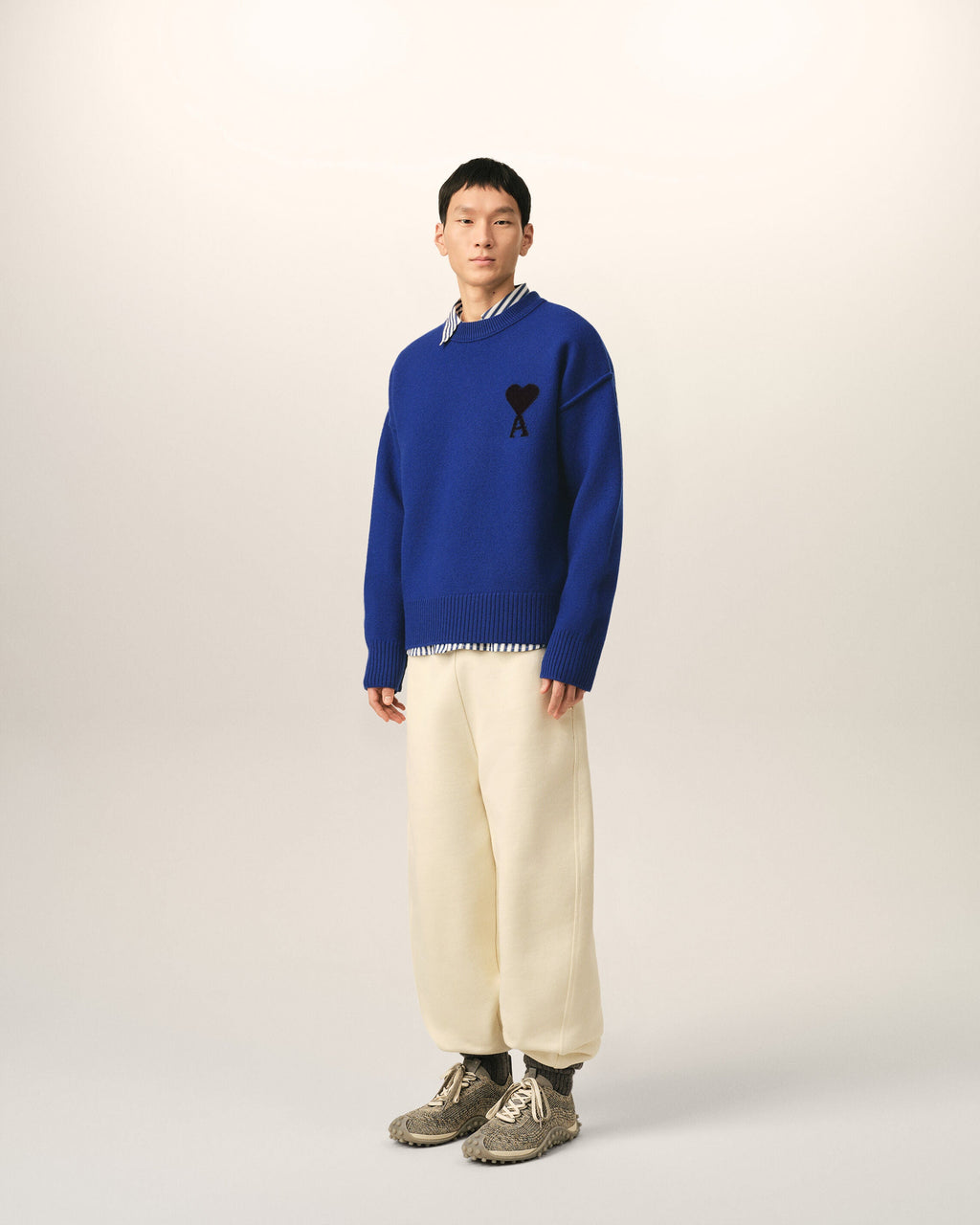 AMI Paris Ami de Cœur Large Logo Crewneck Sweater — Royal Blue / Black — styled side view