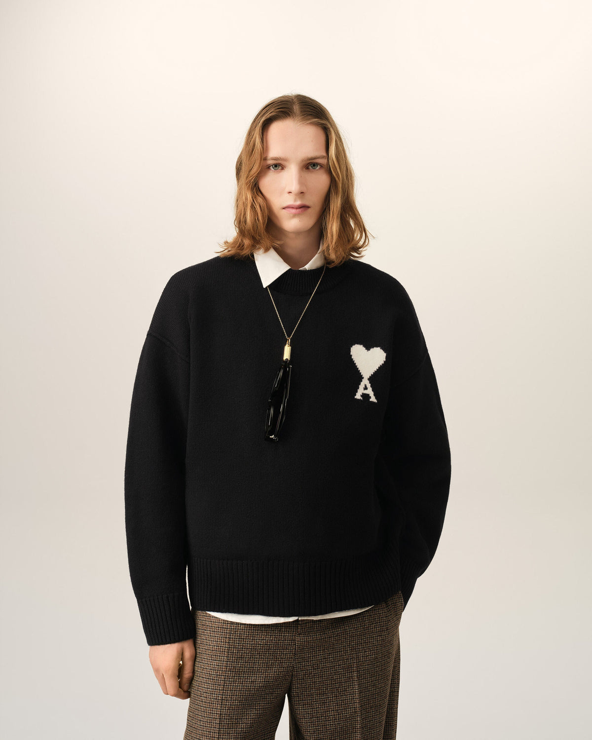 AMI Paris Ami de Cœur Large Logo Crewneck Sweater — Black / Ivory — styled front view