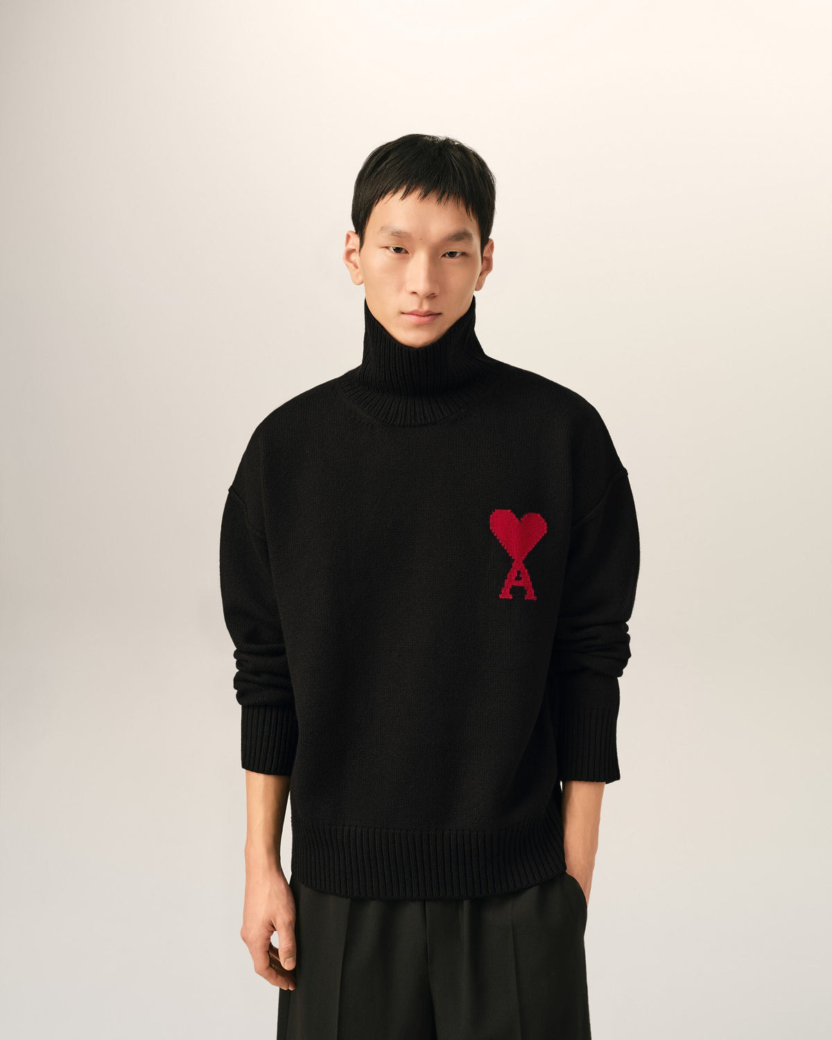 AMI Paris Ami de Cœur Large Logo Funnel Neck Sweater — Black / Red — styled front view